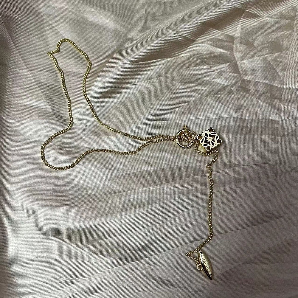 Geometric carved Loewe OT buckle necklace